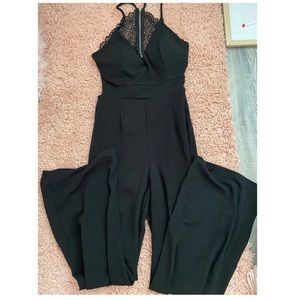 Pantsuit/jumpsuit, never worn, still has tags
